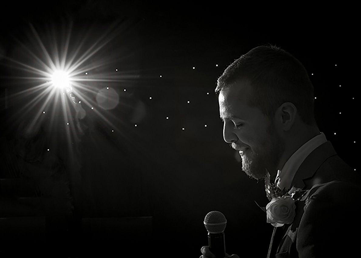 Best Man Giving Speech With Flash Of Light